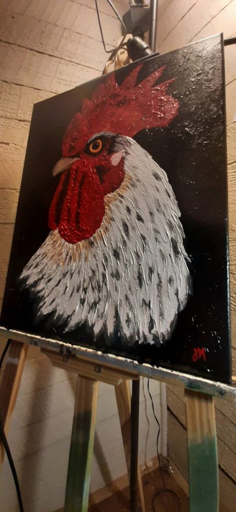 Acrylic painting of a white rooster with a large, bright red comb and huge red waddles on a black background. His eyes are strikingly orange. There is a lot of texture from the paint.