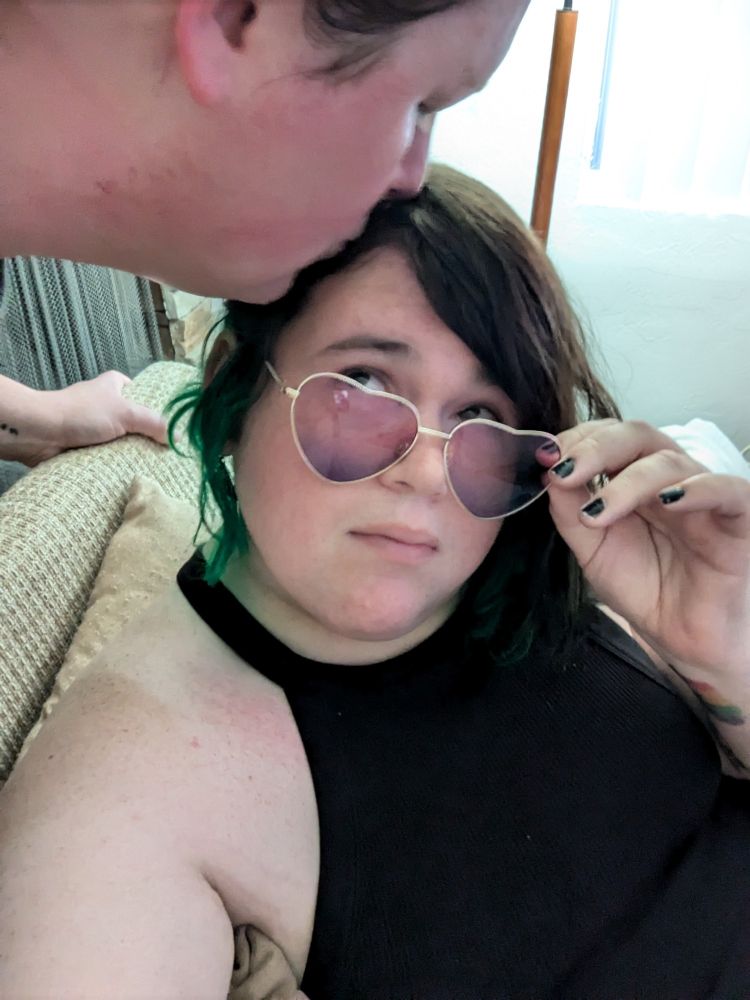 I noticed her kissing me