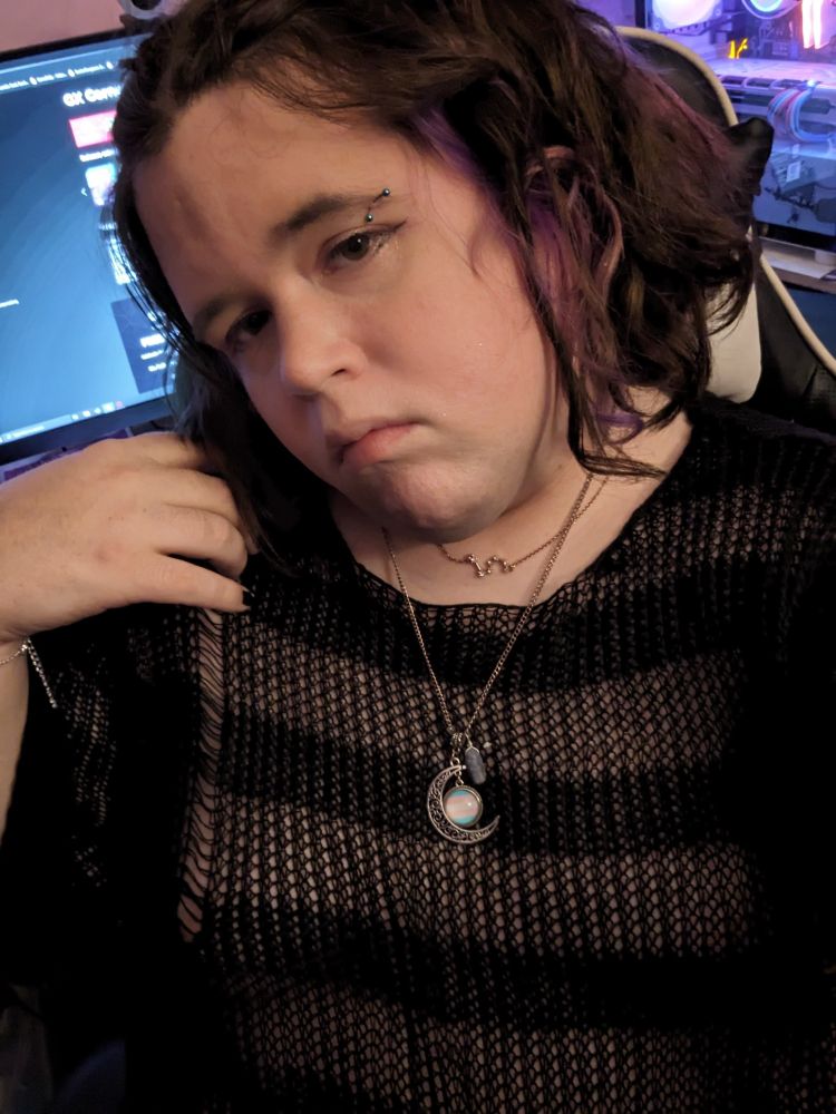 Me in a new mesh top a couple days ago, wearing new birthstones for my girlfriends
