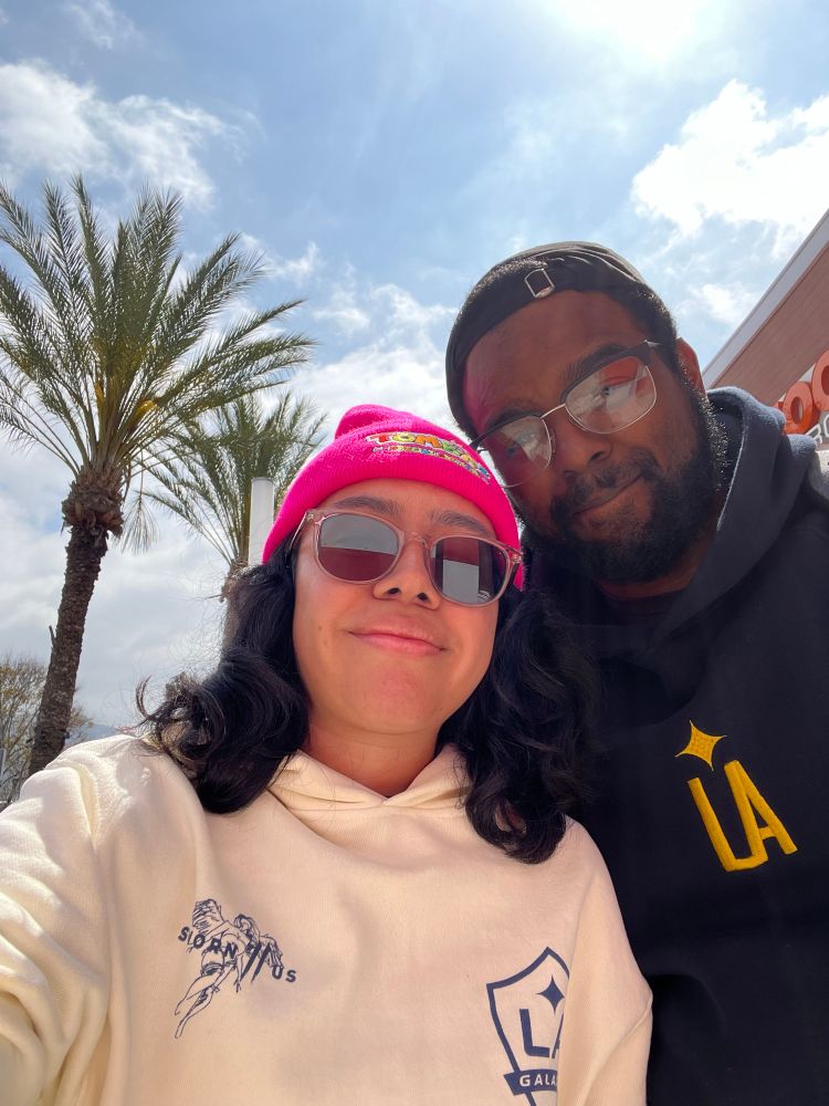 Selfie of Isaiah and Janet in line for switch 2 