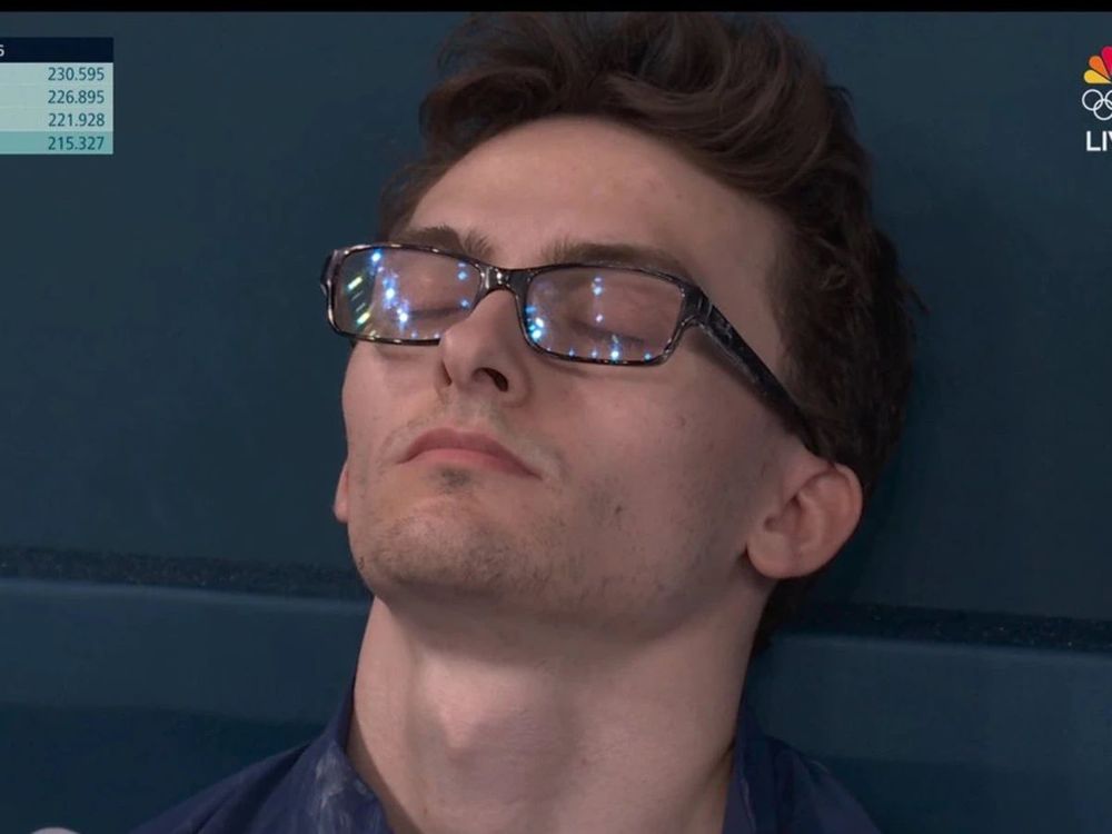 pommel horse guy from us olympics mens gymnastics team resting with his eyes closed before his turn to compete at the olympics