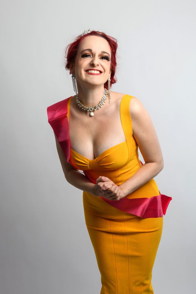 yellow dress pink sash i won