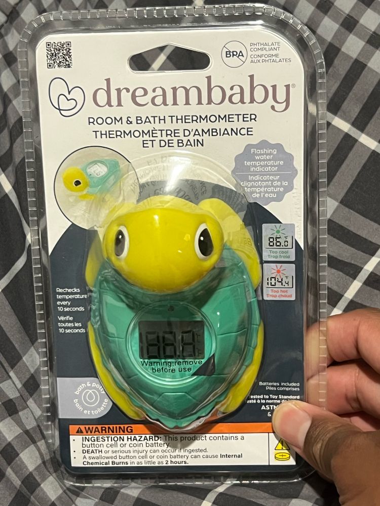 A turtle shaped bath thermometer. 