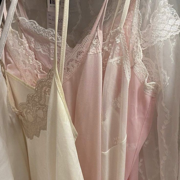 Pink, cream and white laced camisoles