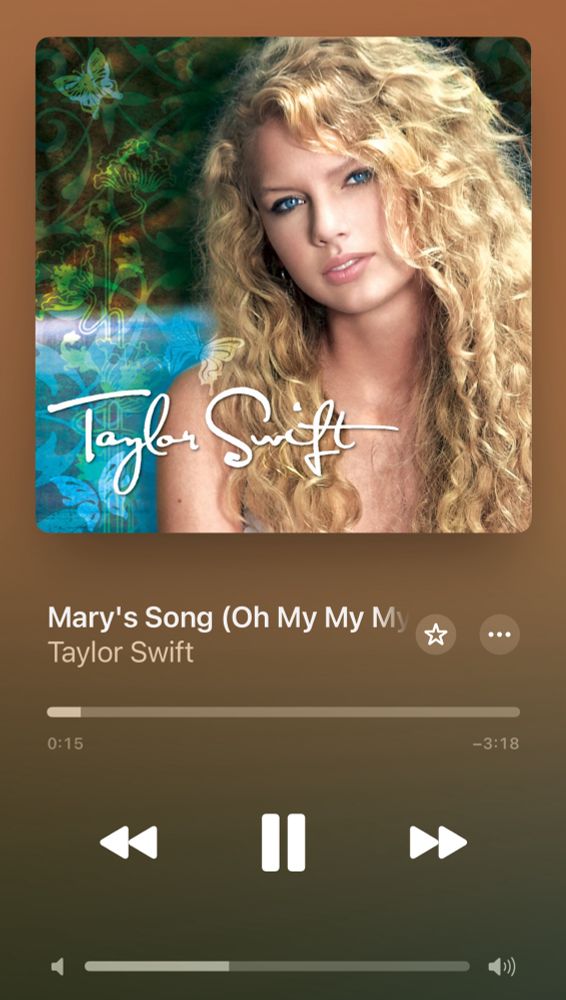 A screenshot from Apple Music depicting the cover of Debut aka Taylor Swift by Taylor Swift, showing the song Mary's Song (oh my my my) playing