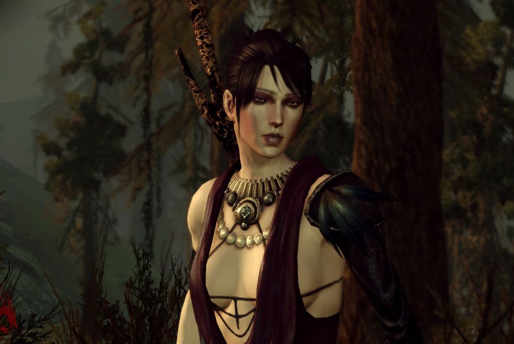 Morrigan from Dragon Age, standing in a forest.
