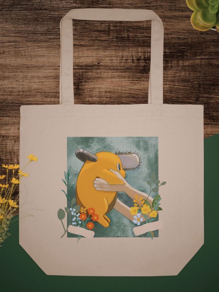 Another Pochita! This time, the same digital painting is on a tan tote bag, with added flowers on the prints borders. 