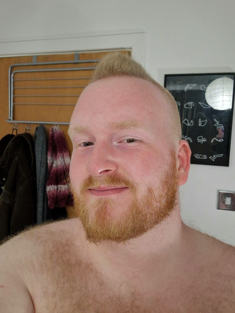 Head and shoulders selfie topless with a fresh haircut