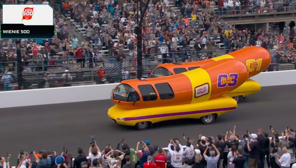 Slaw-Dog passing Chi-Dog for the win at the Wienie 500 to an overjoyed screaming crowd at the Indy Motor Speedway