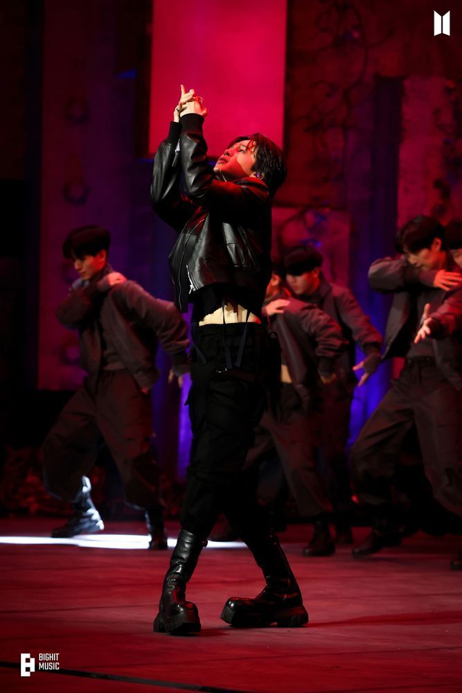 Jimin performing on stage to Set Me Free pt 2, his all black outfit showing just a hint of his lovely, smooth stomach. He has his hands in front of his face, looking up.

When you're done drooling, rehydrate by drinking some water. Maybe listen through the FACE album, too. Just because.