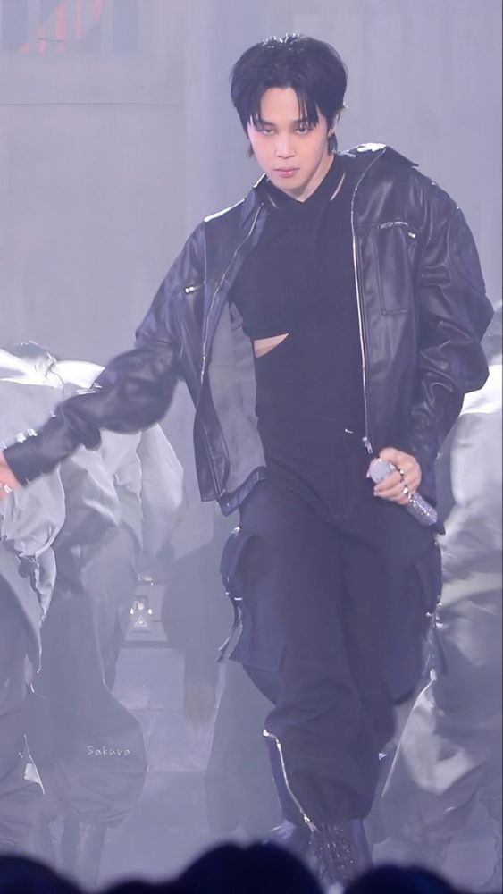 Jimin on stage performing Set Me Free pt 2. He's wearing an all black outfit with a peek-a-boo cut on his rib and is just serving all the cunt, honestly.