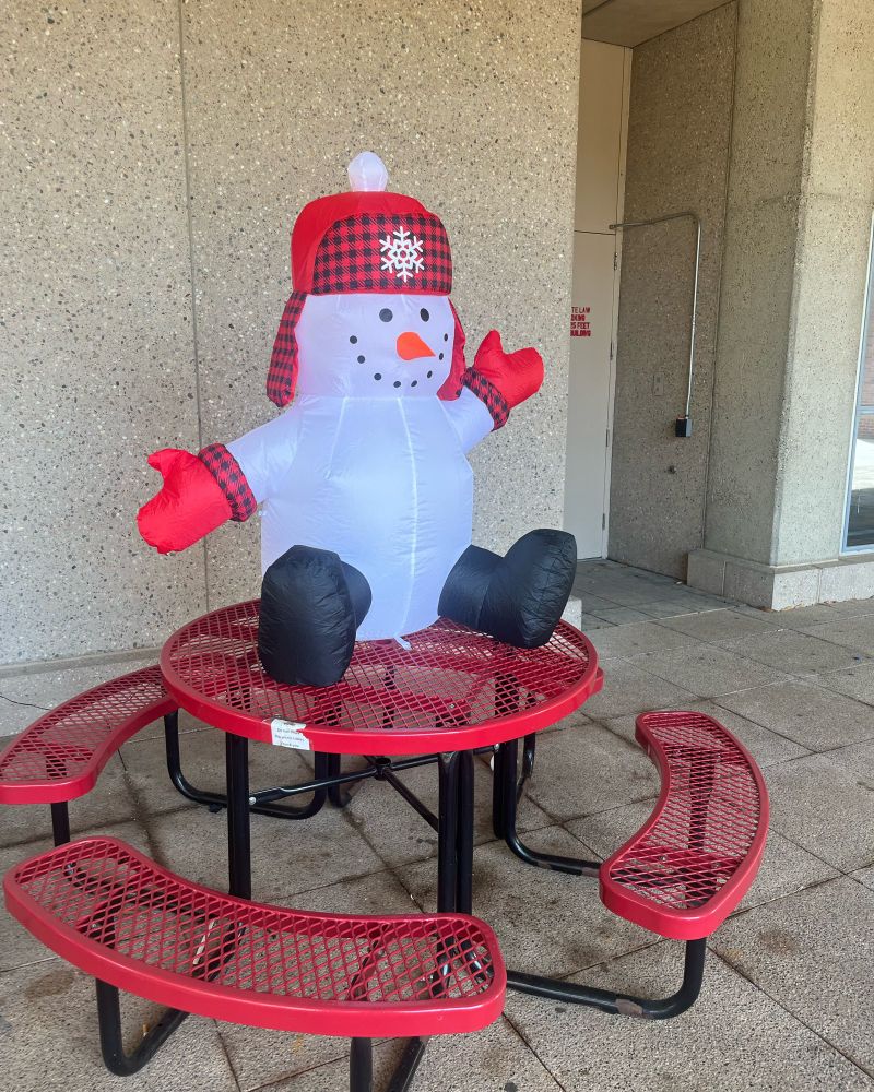 Blow up snowman on a table