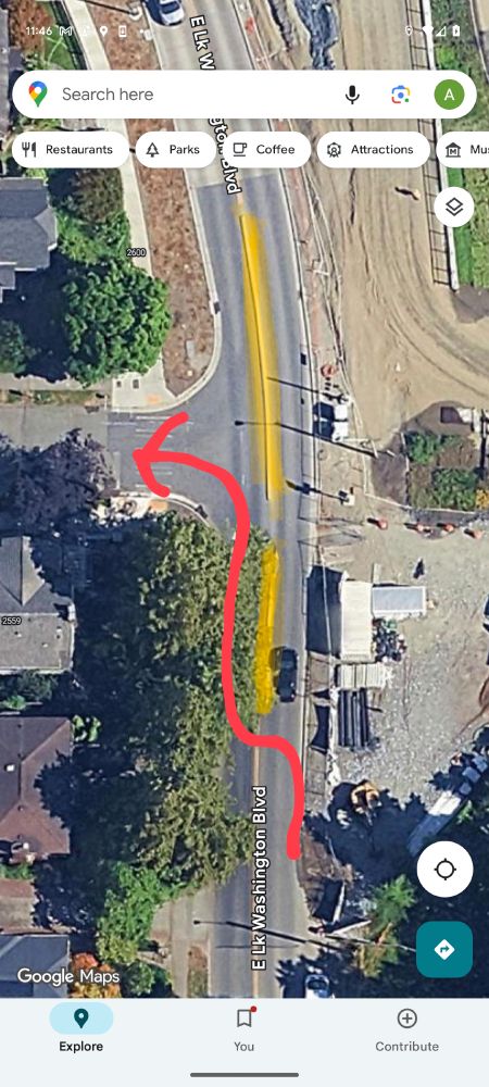 Example of car driving into oncoming traffic to make an illegal left turn that's blocked by a divider. On lake Washington boulevard at 520