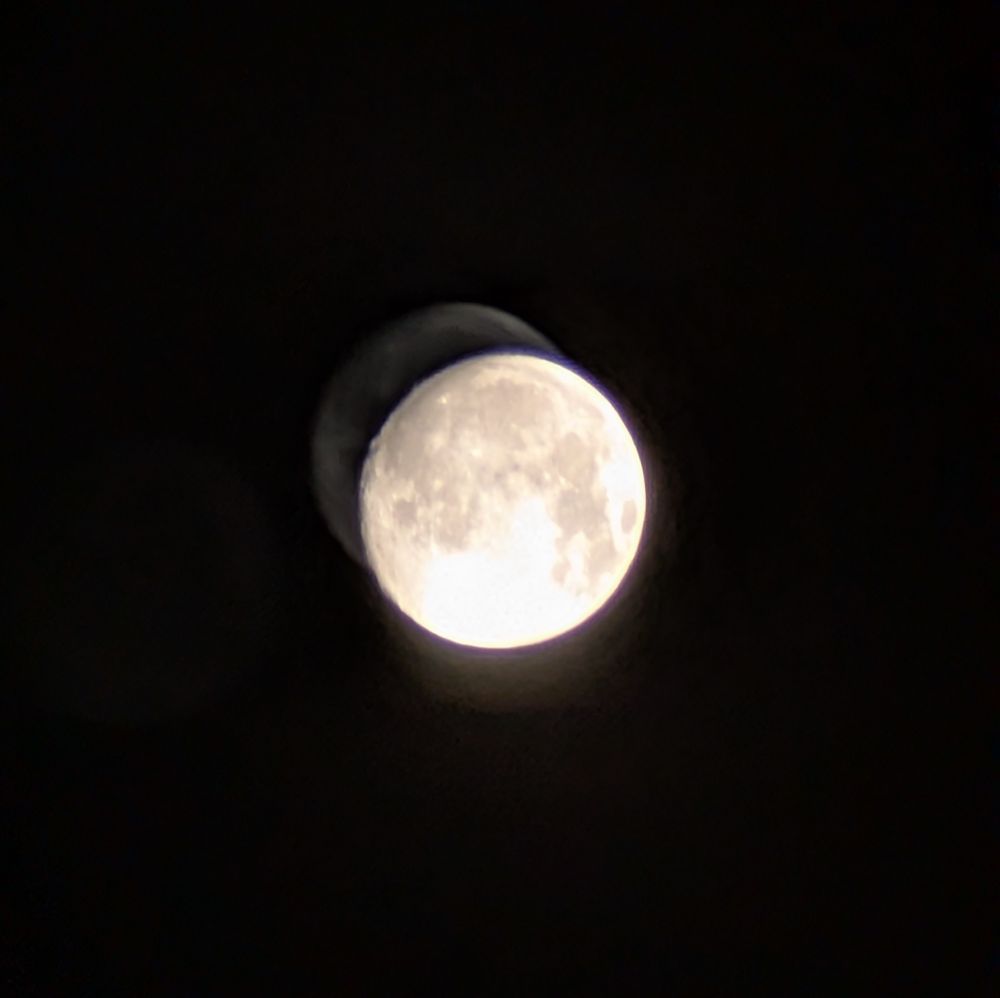 Unedited photo of today's full moon taken with my phone.