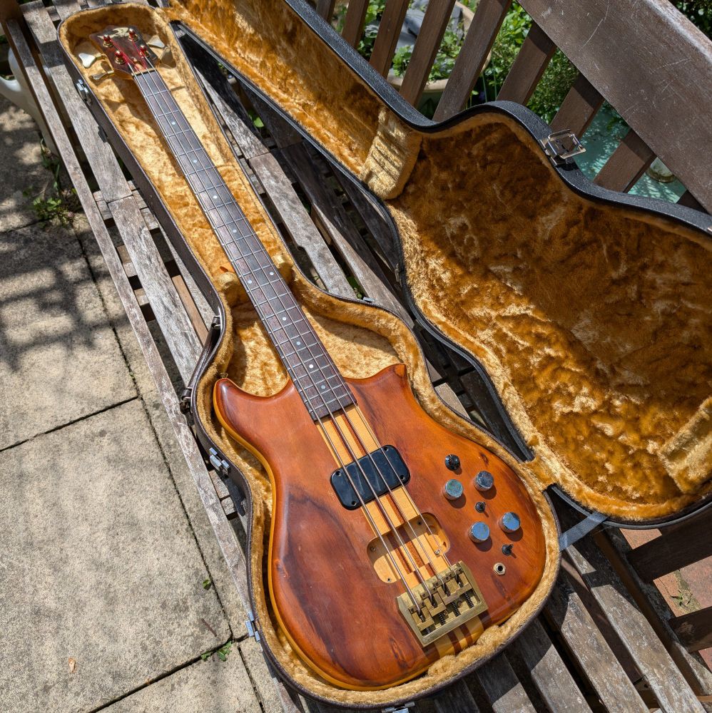 Photo of a Kawai F2B electric bass in hardshell.