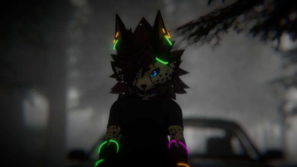 A cheetah Novabeast sitting on the hood of a car in an out of focus foggy dark road. He's wearing several multicoloured glow stick rings around this body and a black sweatshirt with matching trousers.