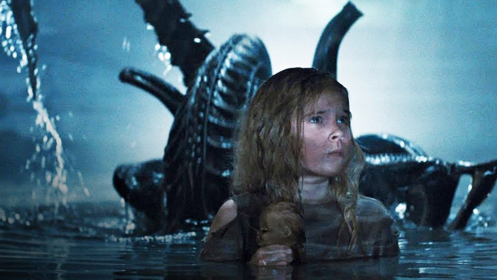 A scene from Aliens movie of a xenomorph coming out of the water behind a little girl 