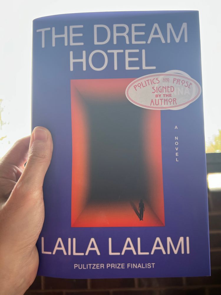 The book titled The Dream Hotel by Laila Lalami.