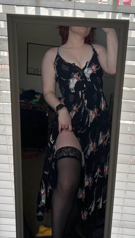I don’t even know how to accurately alt text this right now, just know I have great tits and my dress slit is pulled up to show the lace trimmings of my stockings
