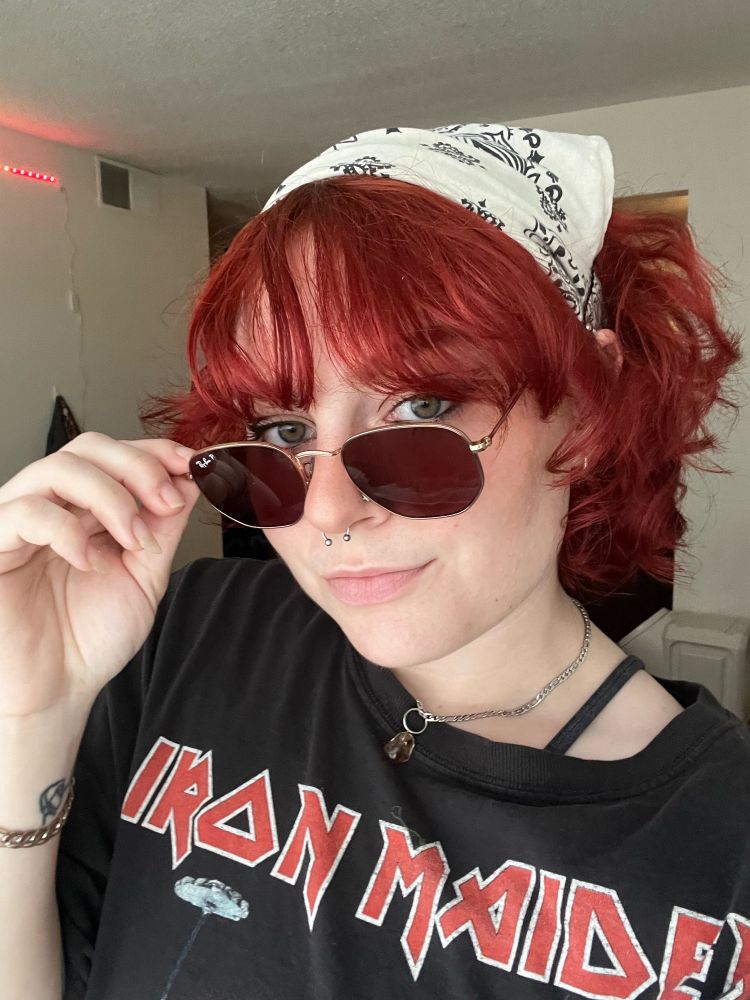 another front camera selfie, this time with me peering over the top of my ray ban sunglasses. nothing new in comparison to the first, other than angle and the glasses
