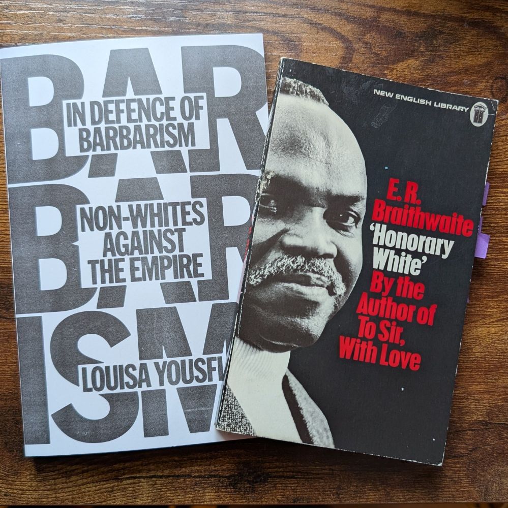 E. R. Braithwaite – “‘Honorary White'” and Louisa Yousfi, trans. Andy Bliss – “In Defence of Barbarism” in paperback on a wooden desktop