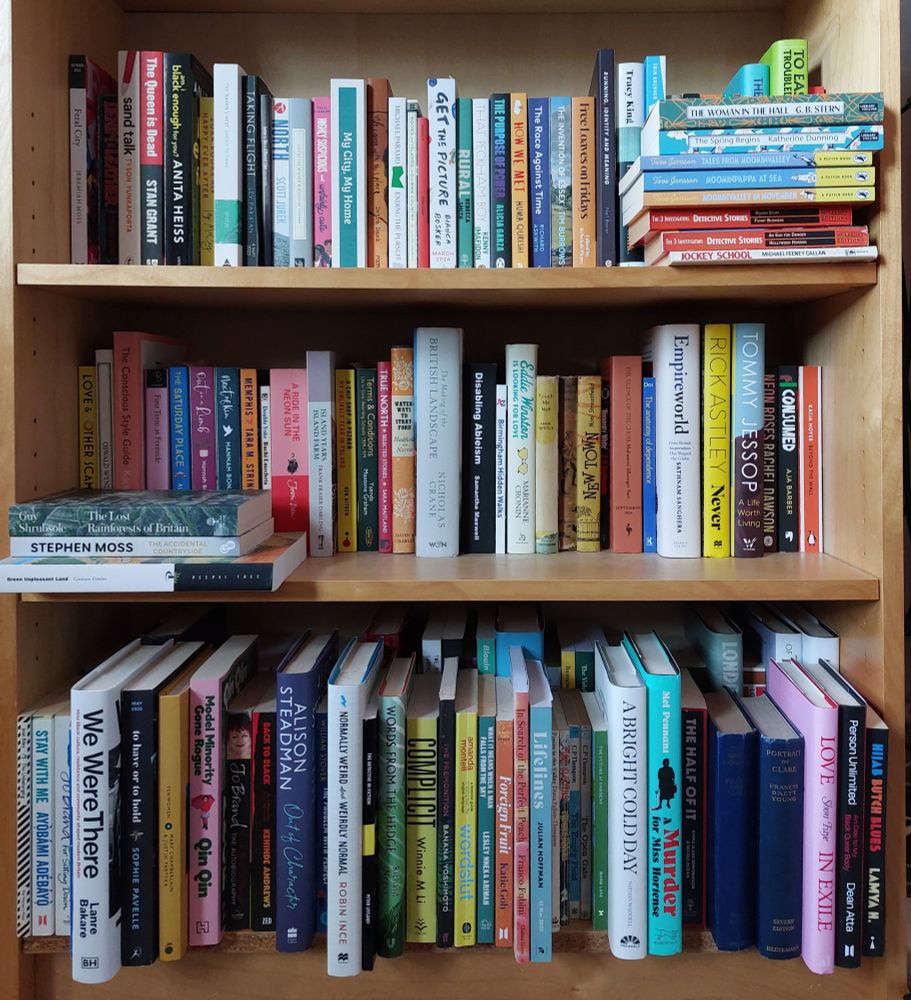A photo of a very full bookcase