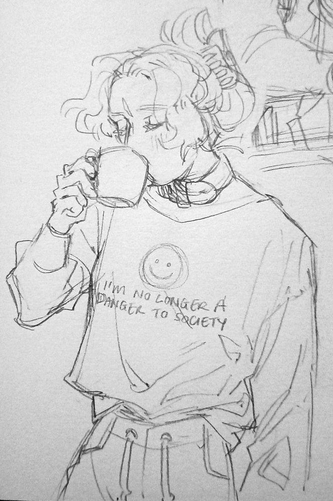 sketchbook pencil drawing depicting char aznable from gundam. char is peacefully drinking her morning coffee. her hair is up in a clip. she wears a baggy sweatshirt and sweatpants, along with a collar around her neck. the sweatshirt has a smiley face and text that reads "i'm no longer a danger to society"