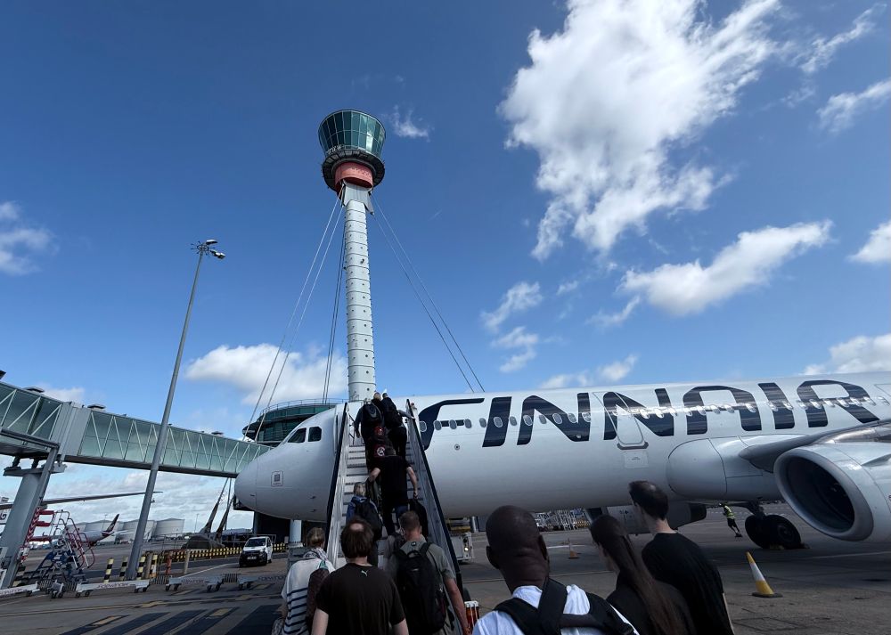 Finnair aircraft (A321) at London Heathrow Airport, Terminal 3. Adjacent to the Control Tower. 