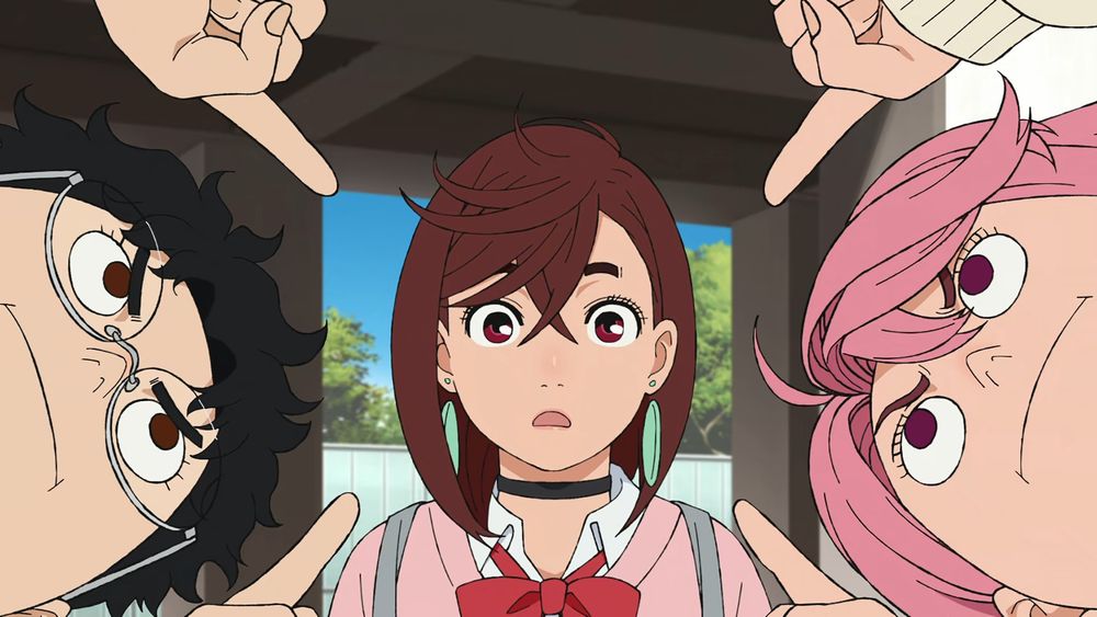 Screenshot from Season 2 Episode 5 of Dandadan. Okarun and Aira point at Momo and go >:T