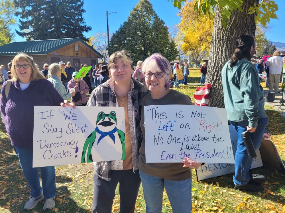 Cody, WY

Two womem embracing and holding signs up to the camera:

"If we stay silent democracy croaks"
"This is not left or right: No one is above the law, even the President!"