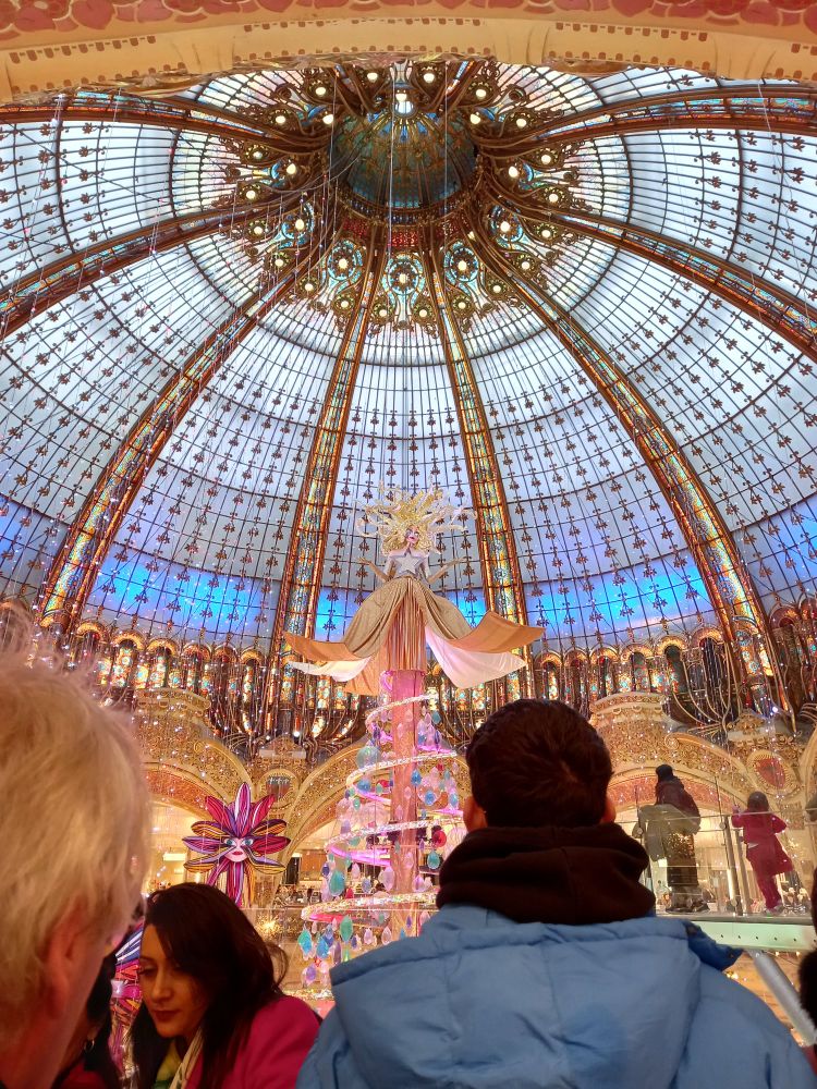 A glass dome in Galeries Lafayette with Christmas decorations