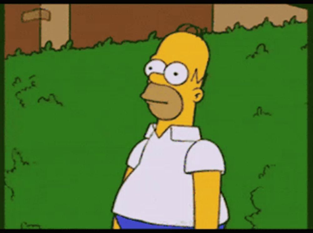 a cartoon of homer simpson standing in a grassy area