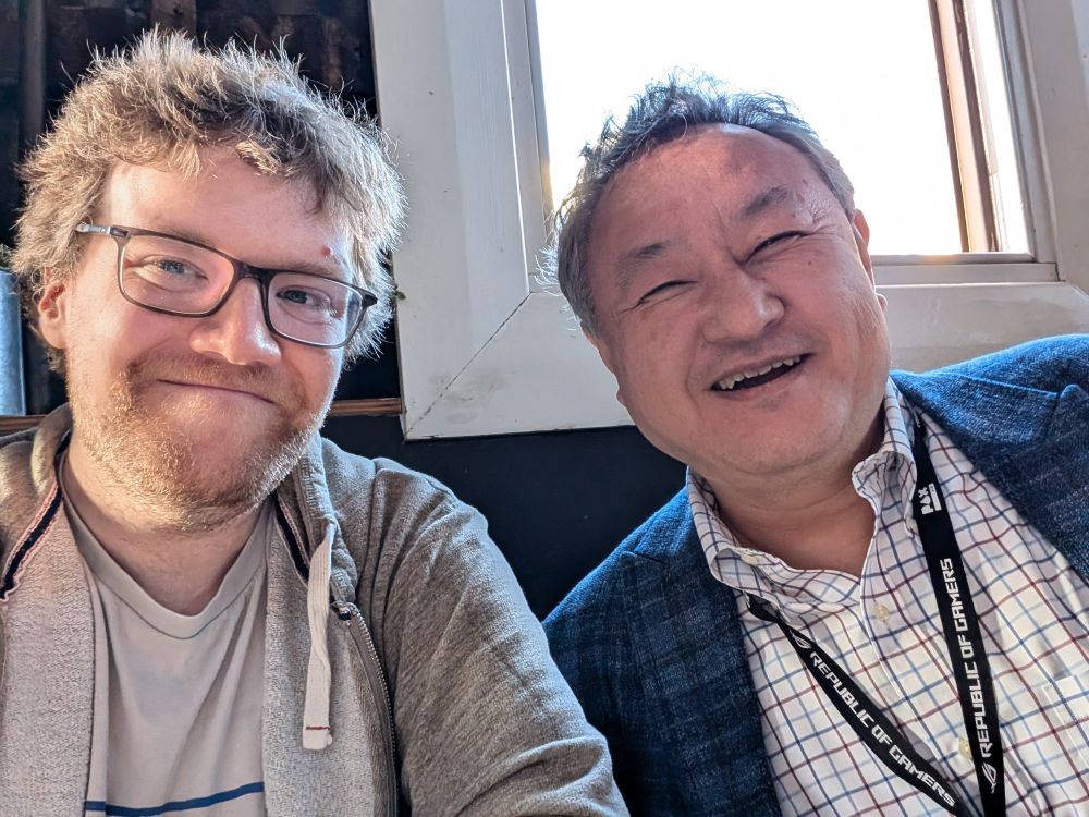 Shu and I taking a photograph to celebrate the end of Melbourne International Games Week 2024.