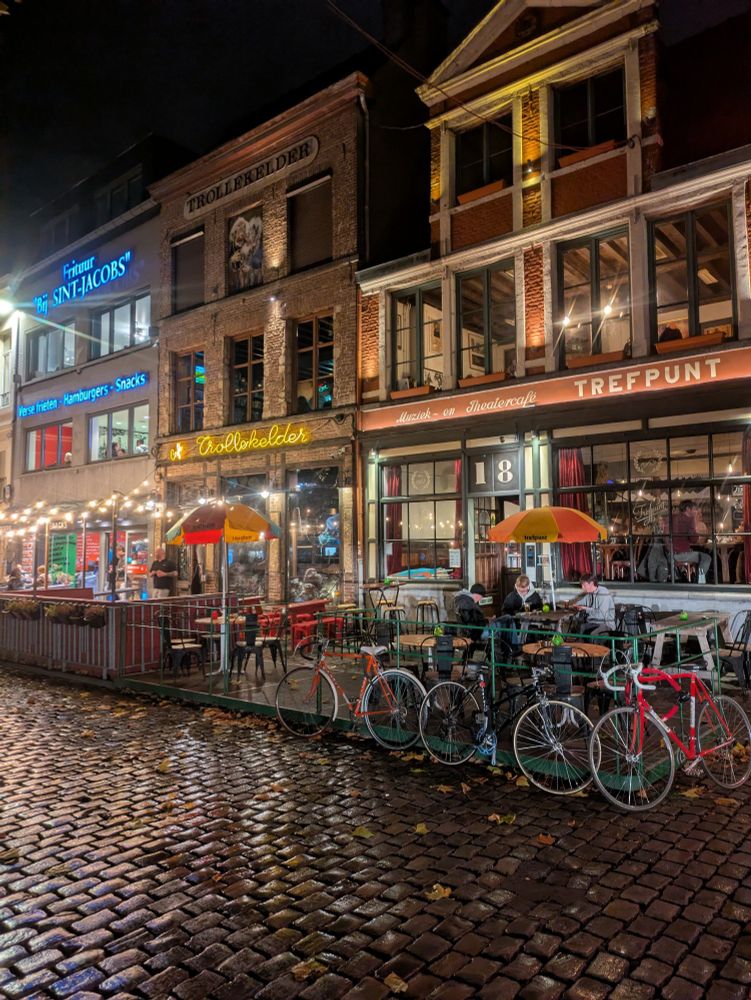 Bikes parked outside Trollekelder in Gent. Cobbled forecourt