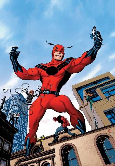 Hank Pym as Giant Man. He stands on top of a building while giant, towering over several other heroes.