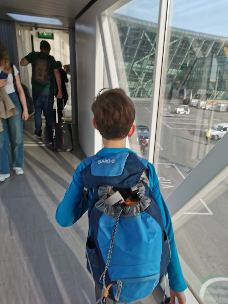 Kid on a gangway arriving at the airport in baku