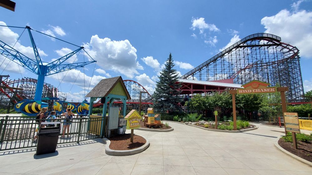 Honeybee Buzzers flying scooters style ride, formerly named Prof. John's Flying Machines, and Wind Chaser RMC roller coaster, formerly named Storm Chaser, within the newly themed Discovery Meadow area of Kentucky Kingdom amusement park.