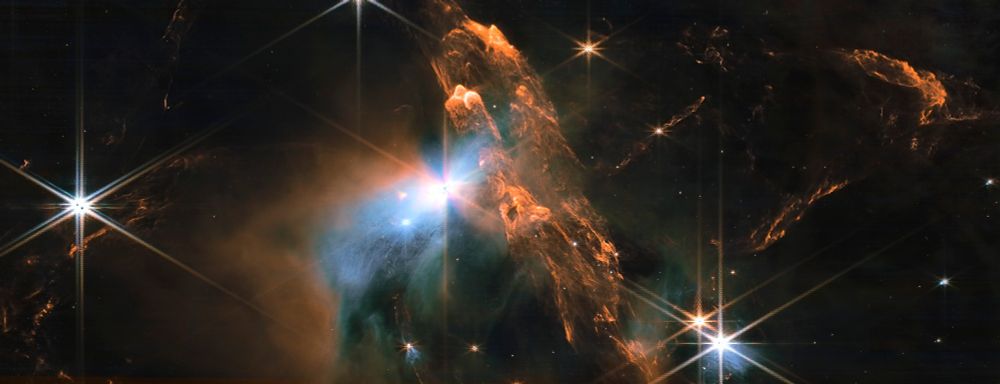 This image from the James Webb Space Telescope (JWST) shows the Rho Ophiuchi cloud complex, a massive star-forming region located about 450 light-years away in the constellation Ophiuchus. The complex is home to a variety of young stars, as well as nebulae, which are clouds of gas and dust where new stars are born. The bright, central region of the image is where many of the most massive stars in the complex are forming. The cooler gas and dust in the outer regions of the image are sculpted by the winds and jets from these young stars.