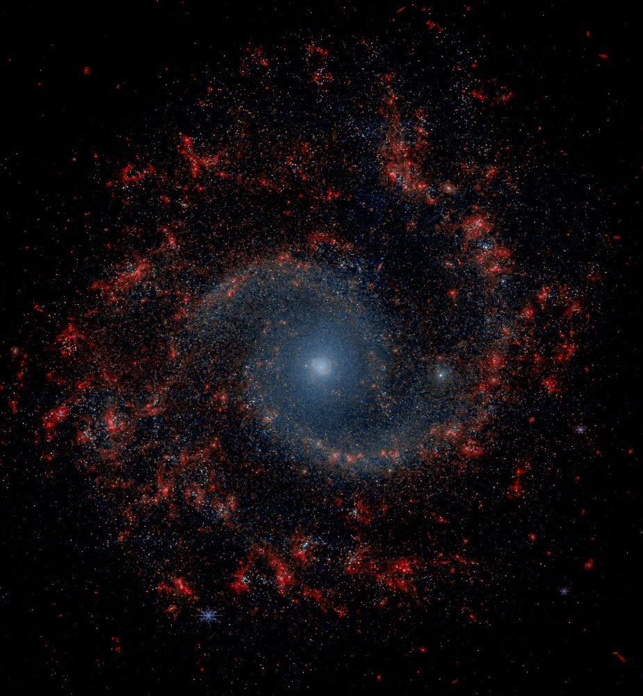 This mesmerizing image, captured by the James Webb Space Telescope's Near-Infrared Camera (NIRCam), unveils the grandeur of the spiral galaxy NGC 3596. The galaxy's bright core, surrounded by a swirling mass of gas and dust, is a testament to the ongoing process of star formation. The NIRCam's keen eye has revealed intricate details within the galaxy's spiral arms, including dark dust lanes and clusters of young, hot stars. This image offers astronomers a unique perspective on the galaxy's structure and evolution, shedding light on the cosmic dance of stars and galaxies.