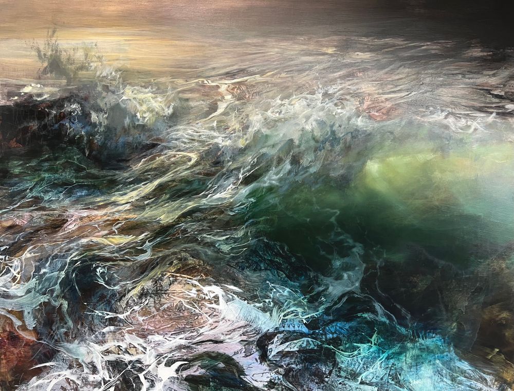 Crashing tide in evening light