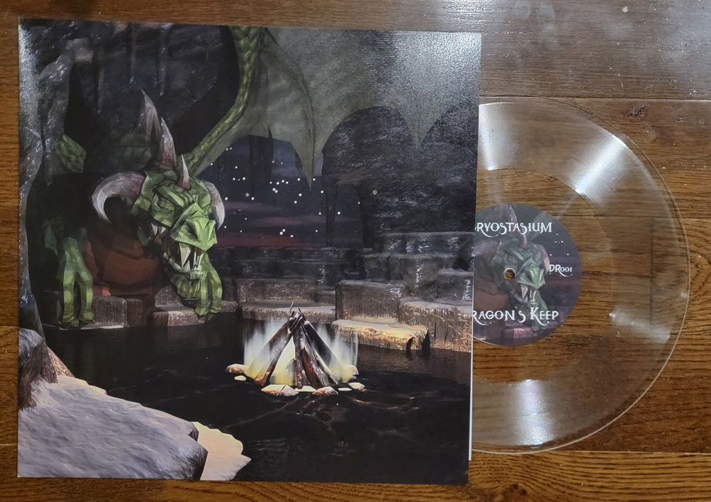 10" lathe cut edition of Cryostasium's Dragon's Keep, cover depicting a green dragon showing its teeth and presiding over a firepit.