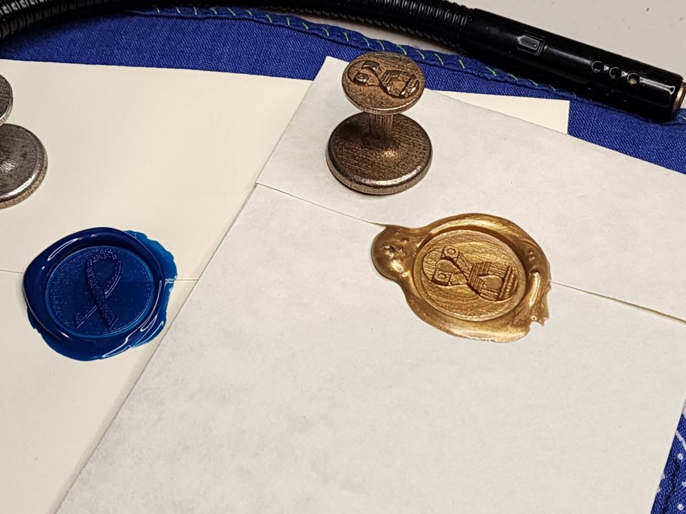 Close up of the Neurodiversity Infinity seal to better show the detail of 7 texture patterns