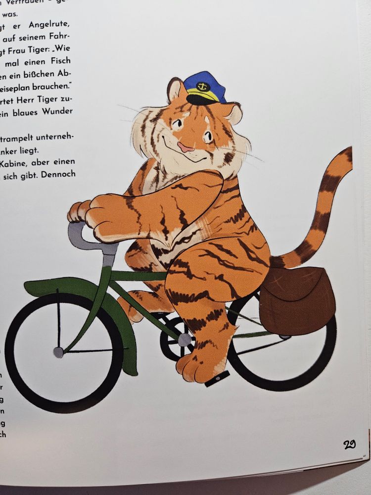 An illustration of an anthropomorphic tiger riding a green bicycle. He is wearing a blue sailor's hat.