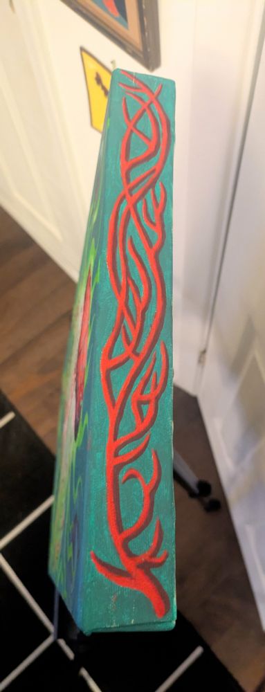 an image depicting the top of the paintings canvas, showing red nerve-like patterns on the darker green background.