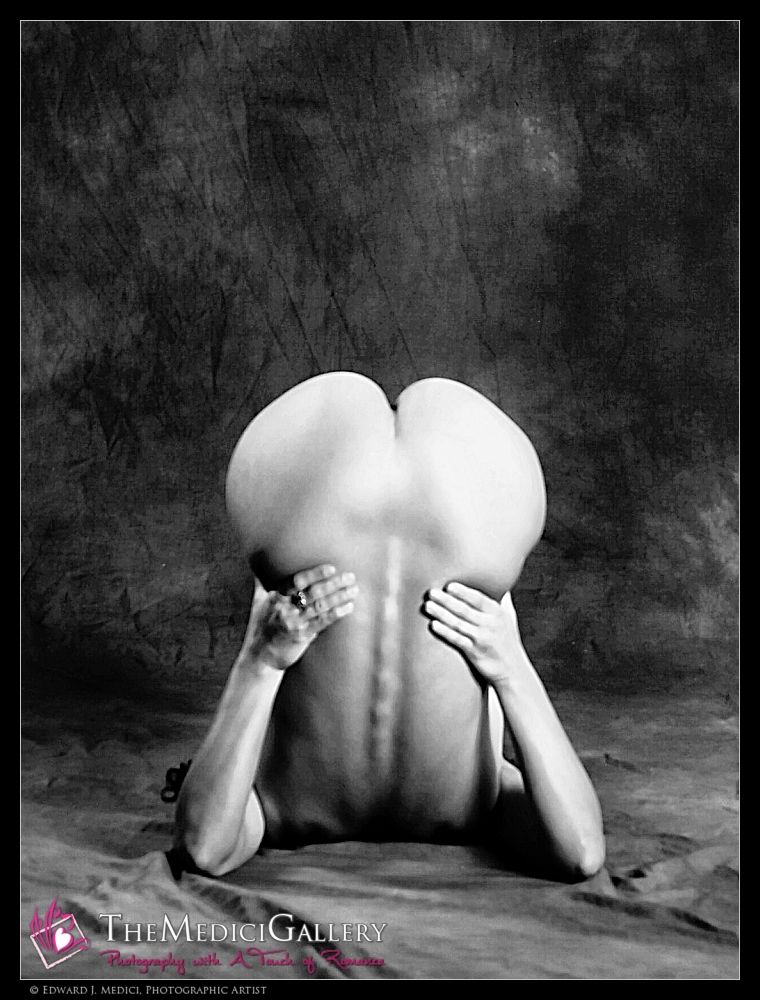 << click for more >>
A black and white photograph of a nude human figure posed upside-down, with the back arched and legs bent over the head, creating an abstract, sculptural form resembling a heart or split sphere. The spine is prominently visible, and the hands frame the lower back. Soft, diffused lighting casts gentle shadows, emphasizing muscular contours and enhancing the surreal, minimalist composition.


Title: Anatomy of Form
Story: Stripped of identity, the body is abstracted into curve and line, muscle and shadow — an exploration of form as both sculpture and architecture. It challenges the gaze, turning comfort into curiosity and anatomy into art. The spine becomes a centerline, the hands frame intent, and the illusion provokes the viewer to question where the body ends and the concept begins.

Model: ig/@IslaFigureModel (not on bsky)

This image is not explicit, and should obviously *NOT* be automatically labeled as 'Adult Content', bsky should really adjust their AI model. This is getting tiresome.

📷©️ Edward J. Medici All Rights Reserved. #TheMediciGallery
No reposts by accounts with any explicit content or reposts.  »»»  If you repost, and I find any explicit content on your page, you *will* be blocked.  «««