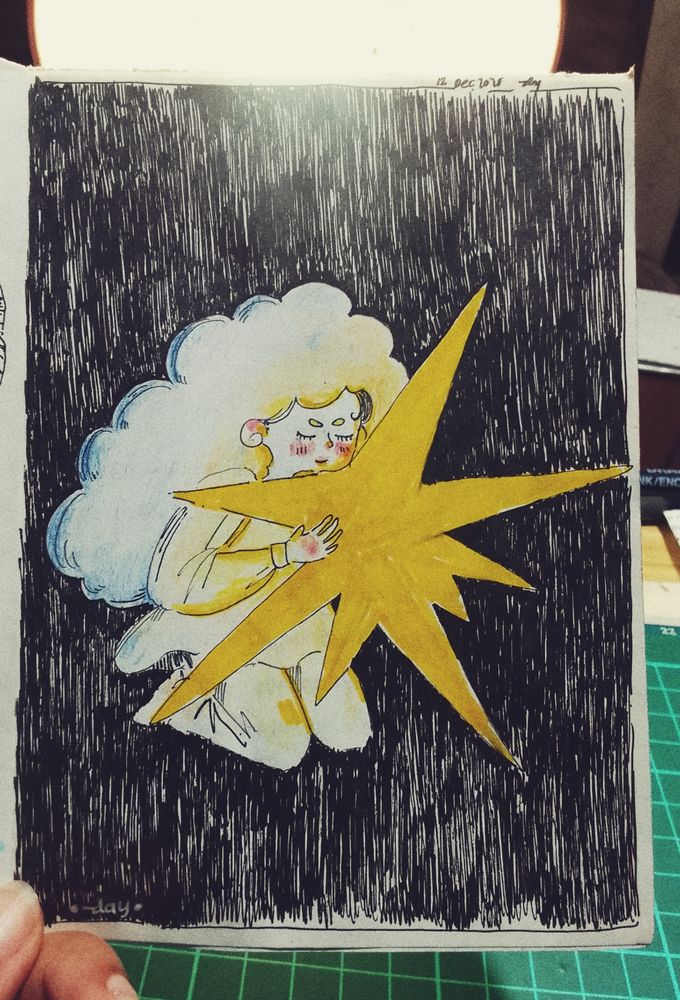 Ilustrasi gambar di atas kertas: seorang gadis memeluk bintang 