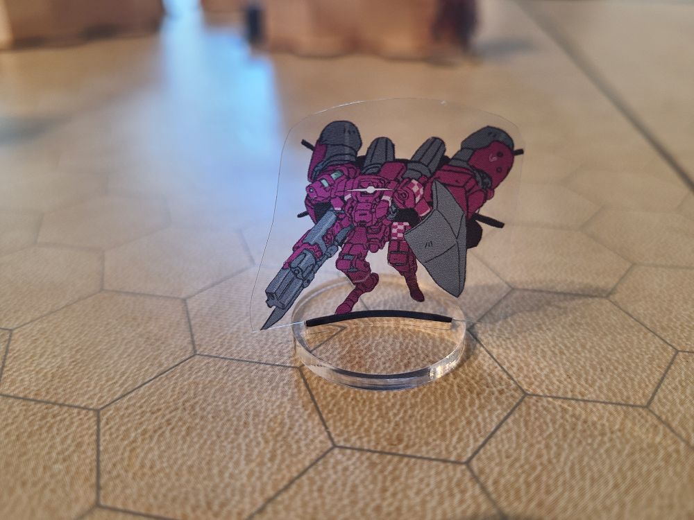 Lancer mech printed on transparency and put onto a base.