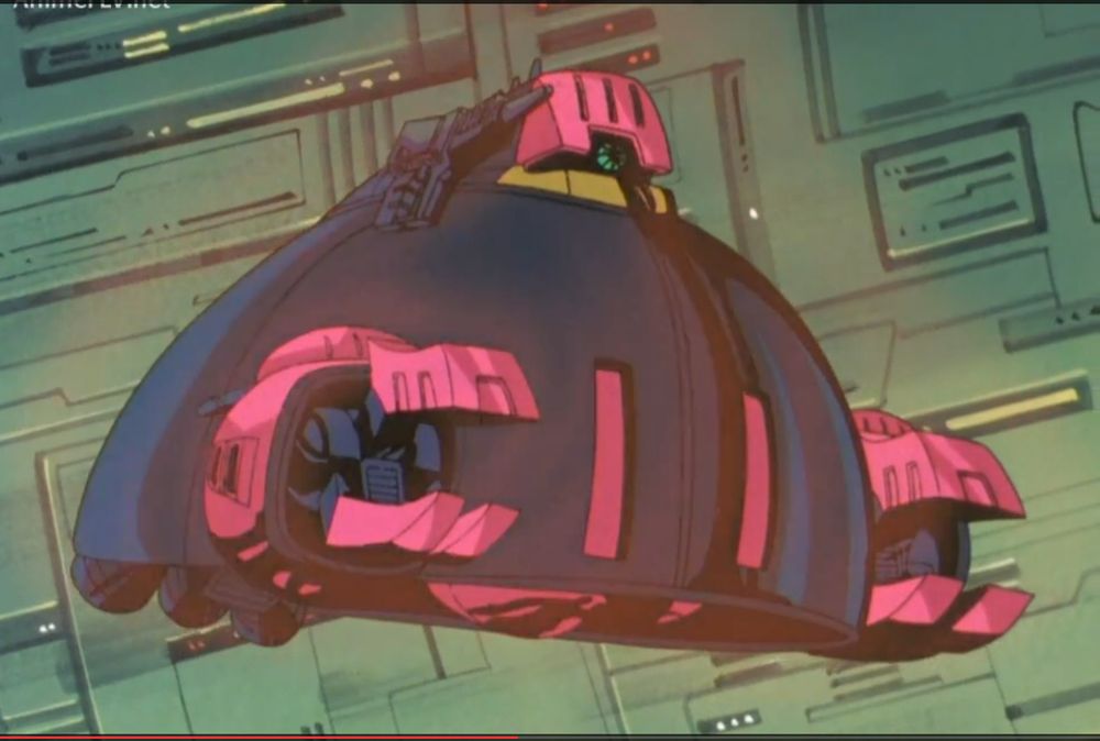 El Baum Doc como mobile armor, es un armatoste con forma de zapato con pinzas y una cabeza de cíclope encima