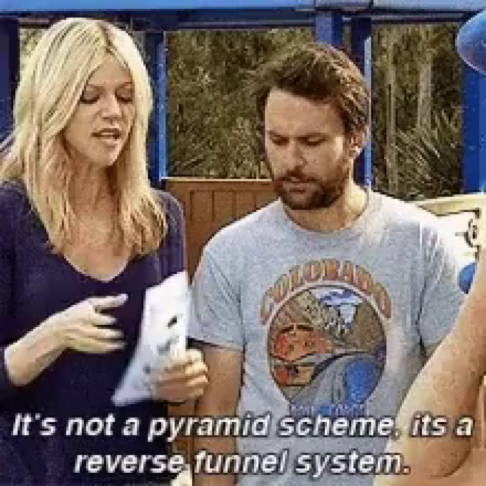 a man and a woman are standing next to each other and the man is wearing a colorado shirt