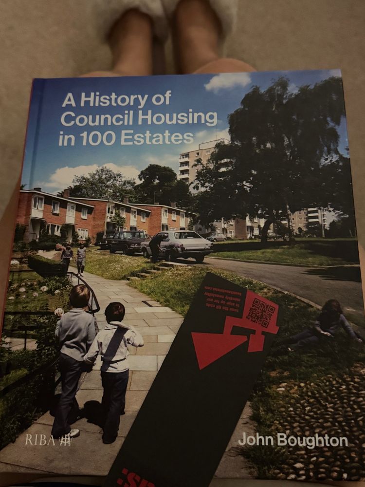 A photo of A History of Council Housing in 100 Estates by John Boughton. A beautiful full colour hardback absolutely full of brilliance. The most joyful kind of scholarship and a solace 